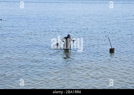 Reparaturarbeiten am Meer Stockfoto