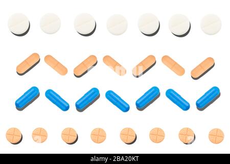 Viele verschiedene bunte Medikamente, Pillen, Tabletten, Kapseln. Apotheken-Themenhintergrund, Nahaufnahme, Konzept Stockfoto