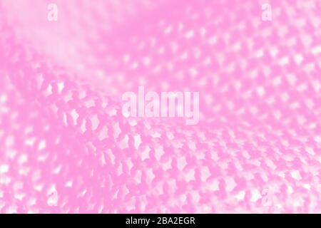Rosa Stoff Mesh Textil Hintergrund, strickende Hintergrundtextur Stockfoto