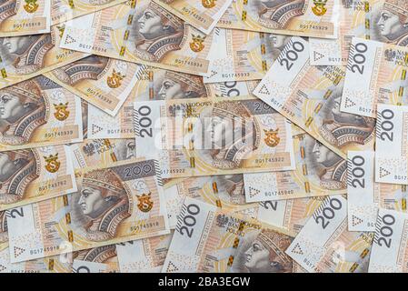 Hintergrund von der Vorderseite der polnischen 200 PLN-Banknote, Hintergrund für Finanzen und Wirtschaft. Stockfoto