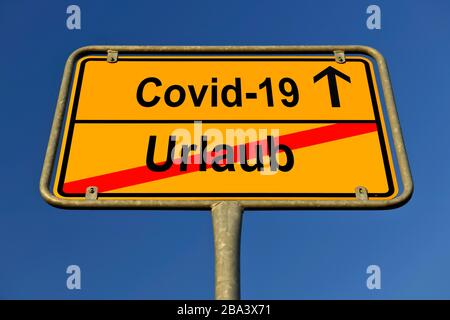 Digital Composing, Symbolbild, Ortsnamenschild, Urlaub, Coronavirus, Sars-CoV-2, Covid-19, Deutschland Stockfoto