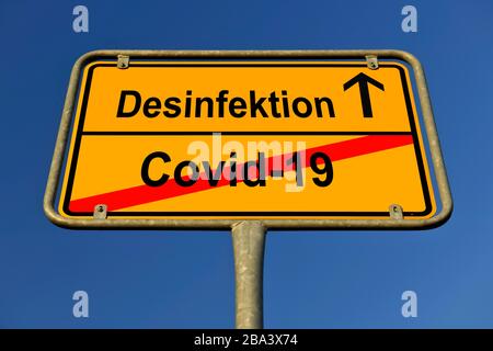 Digital Composing, Symbolbild, Ortsnamenschild, Desinfektion, Coronavirus, Sars-CoV-2, Covid-19, Deutschland Stockfoto