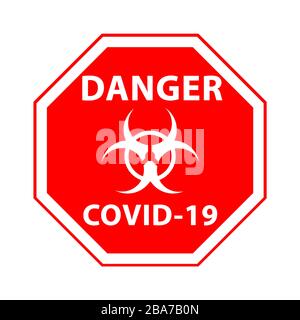 Rotes Symbol für giftige Gefahren mit Aufschrift „Danger Covid-19“ Es isoliert auf weißem Hintergrund Stockfoto