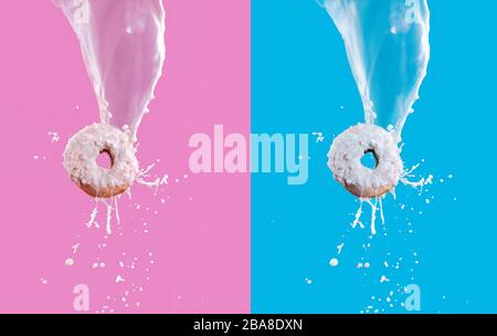 Fliegende Donuts mit weißer Schokolade glasiert und Milch spritzt isoliert auf pinkfarbenem und blauem Hintergrund. Süßes Speisekonzept. Werbung fast Food Poster Stockfoto