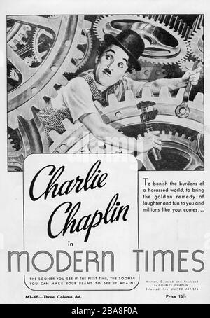 CHARLIE CHAPLIN als Tramp in DER MODERNE 1936 Regisseur/Produzent/Schriftsteller/Musik CHARLES CHAPLIN Stummfilm mit Soundeffekten Charles Chaplin Productions/United Artists Stockfoto