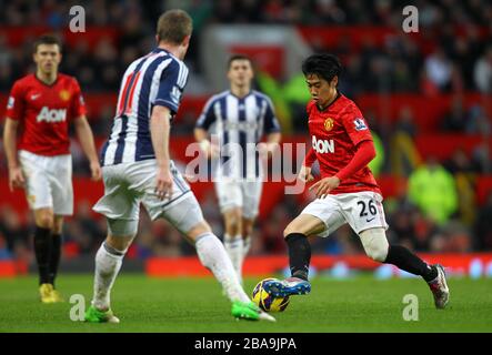 Shinji Kagawa (rechts) von Manchester United im Einsatz Stockfoto