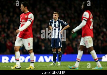 James Morrison von West Bromwich Albion steht niedergeschlagen, nachdem seine Seite Arsenal ein zweites Straftor zugesteht Stockfoto