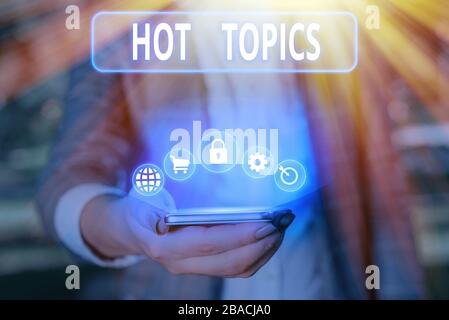 Konzeptionelle Hand schreiben Heiße Themen angezeigt. Konzept Bedeutung betrifft, die eine Menge angezeigt sind, Argumentieren und Diskutieren Stockfoto