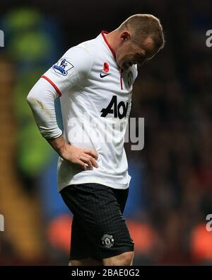 Wayne Rooney von Manchester United kämpft, nachdem er eine Verletzung erlitten hat Stockfoto