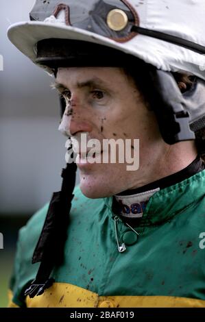 Jockey Tony McCoy nach dem Sieg in My Tent oder Yours in der TGL Events Owen Brown Novices Hürde Stockfoto