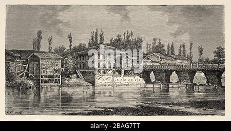 Srinagar-Brücke über den Fluss Jhelum. Jammu & Kashmir, Indien. Reise nach Punjab und Kaschmir von Guillaume Lejean. Alte Gravur El Mundo en la Mano 1878 Stockfoto