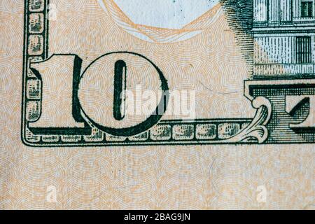 Nahaufnahme der Makrodetails von Geldscheinen in US-Dollar, Detailfoto von US-Dollar. Weltgeldkonzept, Inflation und Sparkonzept Stockfoto