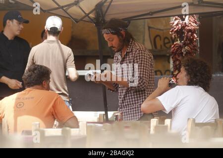 Diego luna comiendo tacos y bebiendo en una comida durante una Fiesta privada en restaurante mexicano en Hemosillo Sonora acompañado con el directo Stockfoto