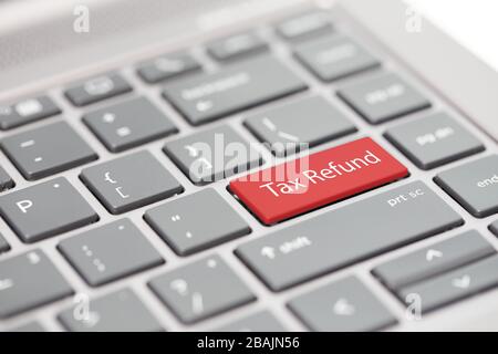 Steuererklärung, GST, SST, Mehrwertsteuer, Steuererklärung und Steuerrückerstattung Wort auf der Tastatur für steuerbezogene Gesetze Stockfoto