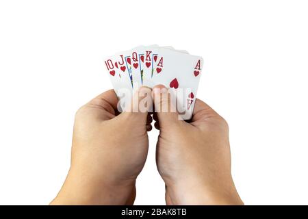 POV-Ansicht eines Mannes, der Spielkarten in seinen Händen hält, isoliert auf weißem Hintergrund. Spielkonzept. Stockfoto