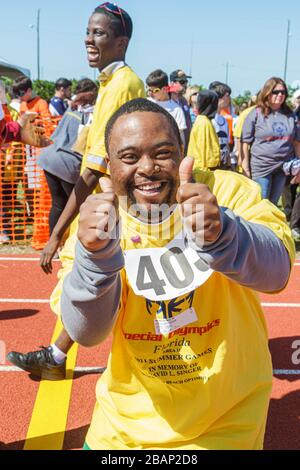 Miami Florida, Liberty City, Traz Powell Stadium, Special Olympics, Bedürfnisse, Track & Field geistig behinderte Menschen, besondere Bedürfnisse, eingeschränkt, schwarzer Mann, Stockfoto