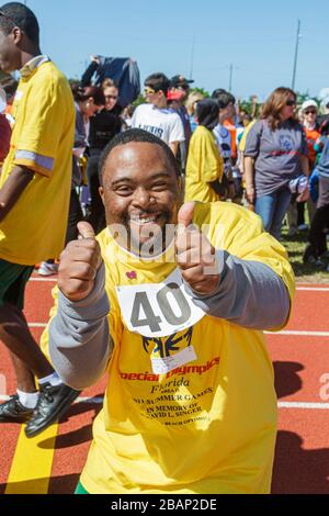 Miami Florida, Liberty City, Traz Powell Stadium, Special Olympics, Bedürfnisse, Track & Field geistig behinderte Menschen, besondere Bedürfnisse, eingeschränkt, schwarzer Mann, Stockfoto