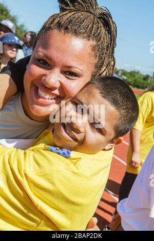 Miami Florida, Liberty City, Traz Powell Stadium, Special Olympics, Bedürfnisse, Track & Field geistig Behinderte spezielle Bedürfnisse, eingeschränkt, Hispanic La Stockfoto