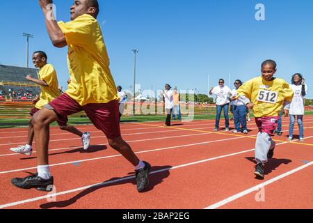 Miami Florida, Liberty City, Traz Powell Stadium, Special Olympics, Bedürfnisse, Track & Field geistig Behinderte spezielle Bedürfnisse, eingeschränkt, Freiwilliger V Stockfoto