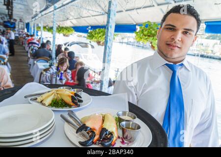 Miami Florida, Casca Seafood Bar & Grill, Restaurants, Restaurants, Restaurants, Restaurants, Cafés, Hispanic, ethnische Männer, Männer, Erwachsene, Kellner usw. Stockfoto