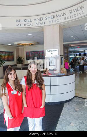 Miami Beach, Florida, Mount Mt. Sinai Medical Center,Zentrum,Krankenhaus,Gesundheitswesen,Lobby,Freiwillige Freiwillige Freiwillige arbeiten Arbeiter,Teamarbeit wor Stockfoto