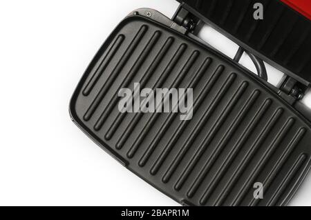 Home verwenden Sie elektrischen Grill auf isoliertem weißem Hintergrund Stockfoto