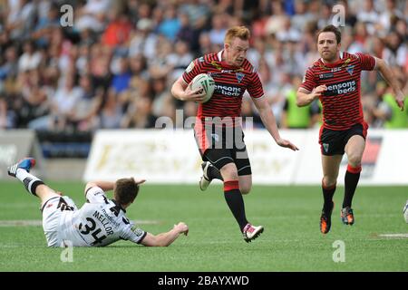 Warrington Wolves' Chris Riley bricht zum Score weg Stockfoto