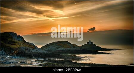 Mumbles Kopf, während die Sonne aufgeht Stockfoto