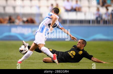 Evertons Leon Osman und Malagas Isco in Aktion Stockfoto