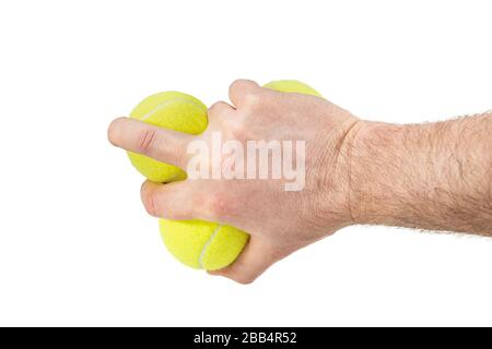 Tennisbälle in männlicher Hand Stockfoto