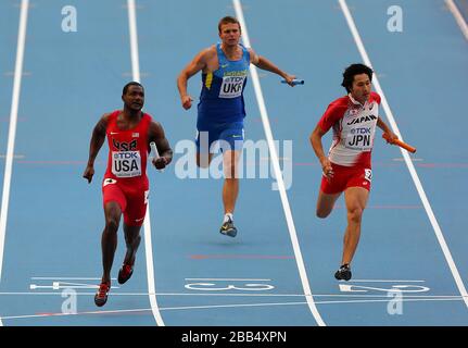 Der US-Amerikaner Justin Gatlin (links) gewinnt die 4x100-Meter-Staffel der Männer Heat zwei vor dem Ukrainer Vitaliy Korzh (Mitte) und dem japanischen Shota Iizuka Stockfoto