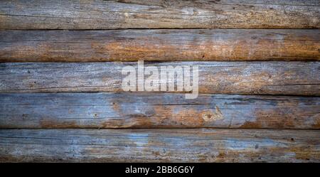 Holzhintergrund. Alte Holzwand eines rustikalen Hauses mit Textur. Stockfoto