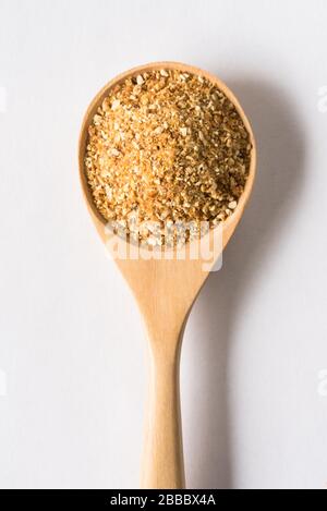 Orange Peel auf einem Holzlöffel Stockfoto