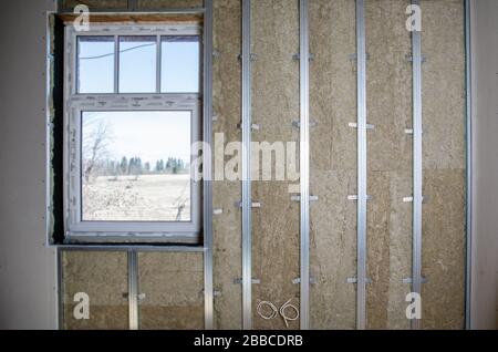 Interior repair, construction and renovation. Metal profiles, fasteners, stone wool insulation and plasterboard sheets Stockfoto