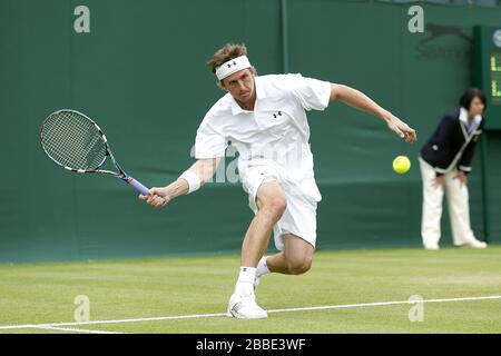 Russlands Igor Andrejew im Einsatz gegen den Polen Lukasz Kubot während des Tages eine der Wimbledon Meisterschaften im All England Lawn Tennis and Croquet Club, Wimbledon. Stockfoto