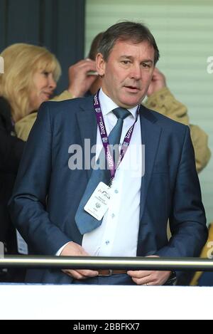 Der ehemalige Manchester United Spieler Bryan Robson auf der Tribüne Stockfoto