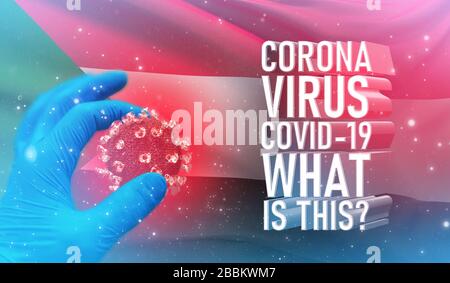 Coronavirus COVID-19, häufig gestellte Frage - was ist es Text, medizinisches Konzept mit Flagge des Sudan. Pandemische 3D-Darstellung. Stockfoto
