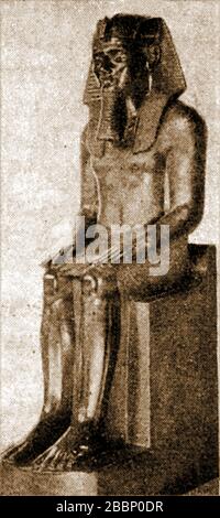 Ägyptologie - EIN 1920 gedrucktes Bild, das eine Statue des Vaters von Akenhaten (alias Echnaton, Akhenaton, Ikhnaton, Khuenaten, Amenophep IV) Amenophis III zeigt Stockfoto