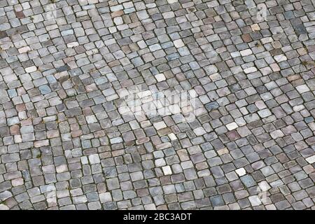Textur der Straße mit grauen Kopfsteinpflaster Stockfoto