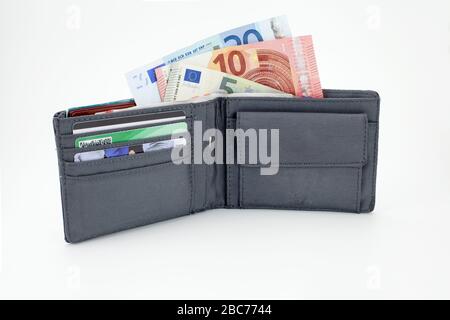 Öffnen Sie männliche Brieftasche mit Banknoten (Euro-Währung) Stockfoto