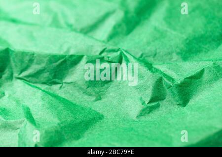 Zerknitterter, grüner Papiertextur abstrakter Hintergrund Stockfoto