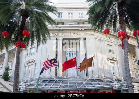 Eintritt zum Fullerton Hotel, Boat Quay, Central Business District (CBD), Downtown Core, Central Area, Singapur Stockfoto
