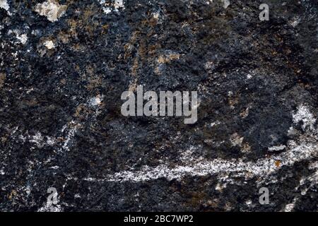 Granit schwarz mit weißen Streifen Hintergrund Stockfoto