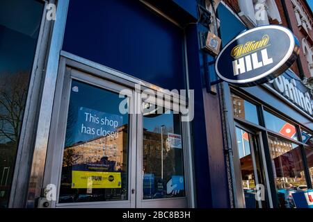 Kürzlich geschlossen William Hill High Street Bookmaker / Wettshop - Exterieur Logo / Signage - London Stockfoto