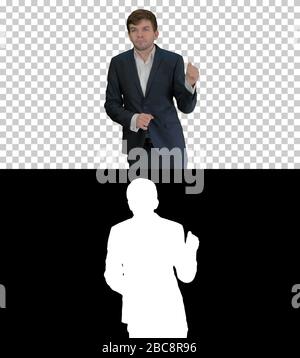 Auf Alpha Matte. Mittlere Aufnahme. Arroganter Geschäftsmann in einem Anzug tanzt, Alpha Channel. Professioneller Schuss. Stockfoto