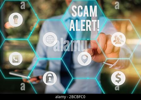 Konzeptionelle Hand schreiben übersicht scam Alert. Konzept Bedeutung Warnung jemand über Regelung oder Betrug bemerken, die ungewöhnliche Stockfoto