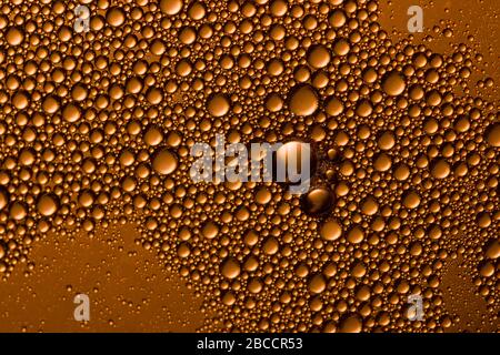 Yellow orange water drops background. Soft focus , close up Stockfoto
