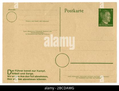 Deutsche historische Postkarte: Ungebraucht, mit Propagandaslogan, Adolf Hitler-Profilgravur aufgedruckte Briefmarke, 5 Pfennige, Deutschland, Drittes Reich Stockfoto