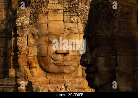 Angkor Tom, Bayon Smilie Gesichter Stockfoto