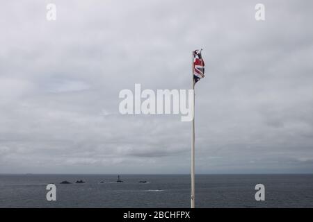 Union Jack am Ende des Landes symbolisch für den Brexit Stockfoto